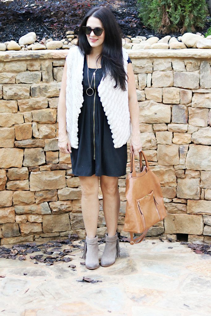 fur-vest-black-dress-sunglasses