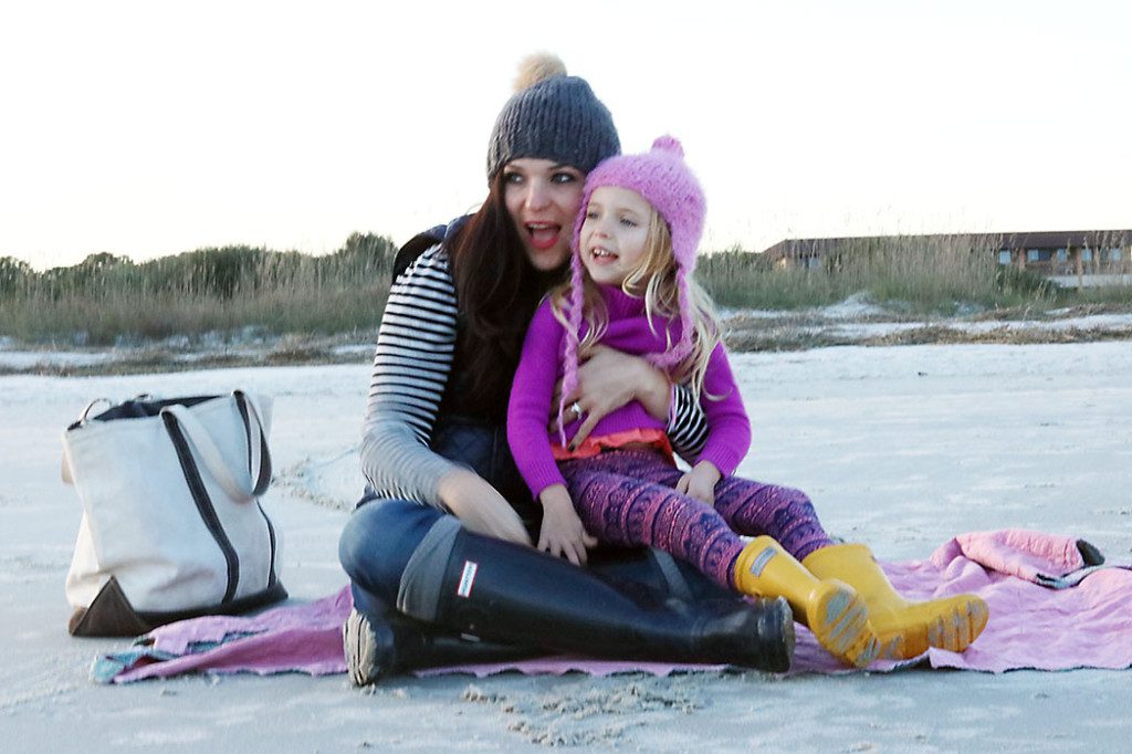 beach-outfit-sitting-on-the-sand-with-child