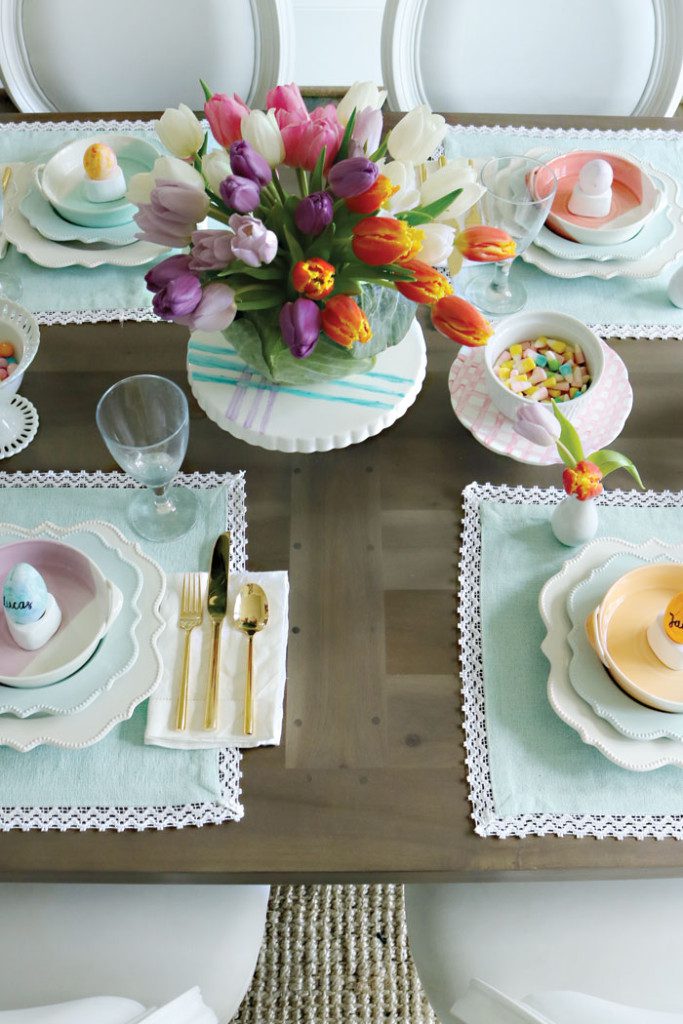 pastel-colored-easter-table-with-tulips, Easter-table-decorations, spring easter table decorations, easter tablescapes, easter table settings, DIY easter, simple easter table, easter centerpieces, ideas, christian, spring, cheap, cute fun easter place settings