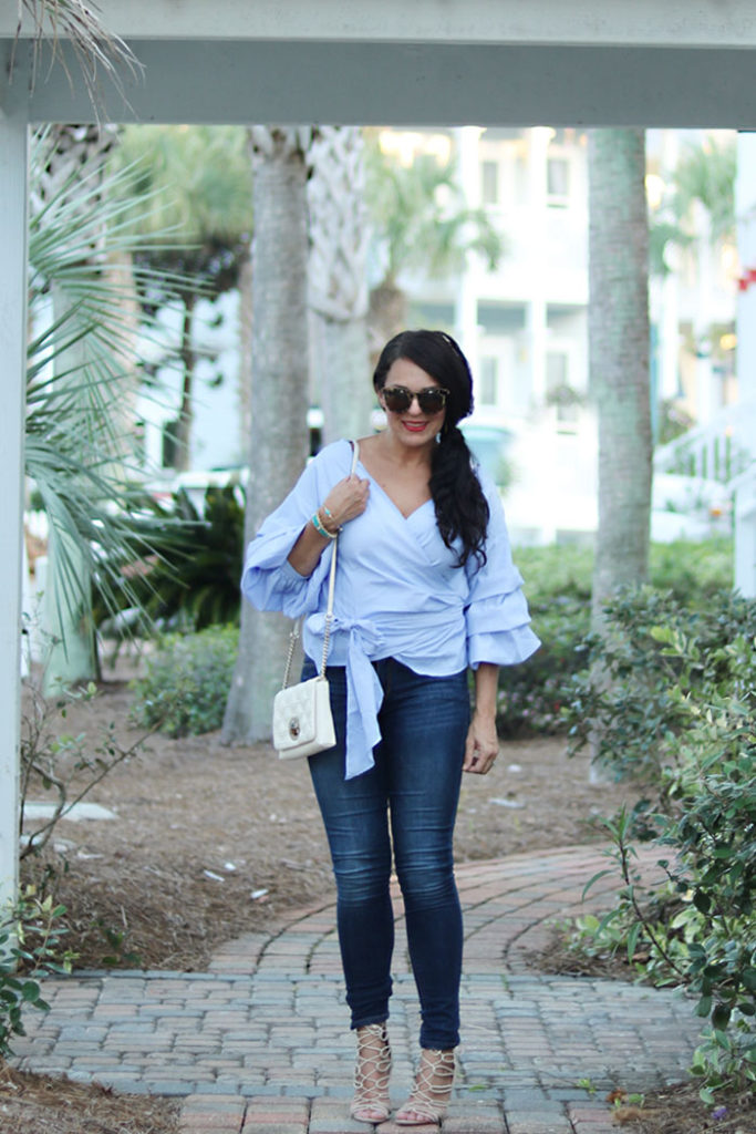 ruffled-shirt-with-jeans-shop-bop, ruffled-sleeve-wrap-shirt-and-jeans, laced heels, shop bop, classy blue on blue outfit styling fall fashion trend 2016, beach style