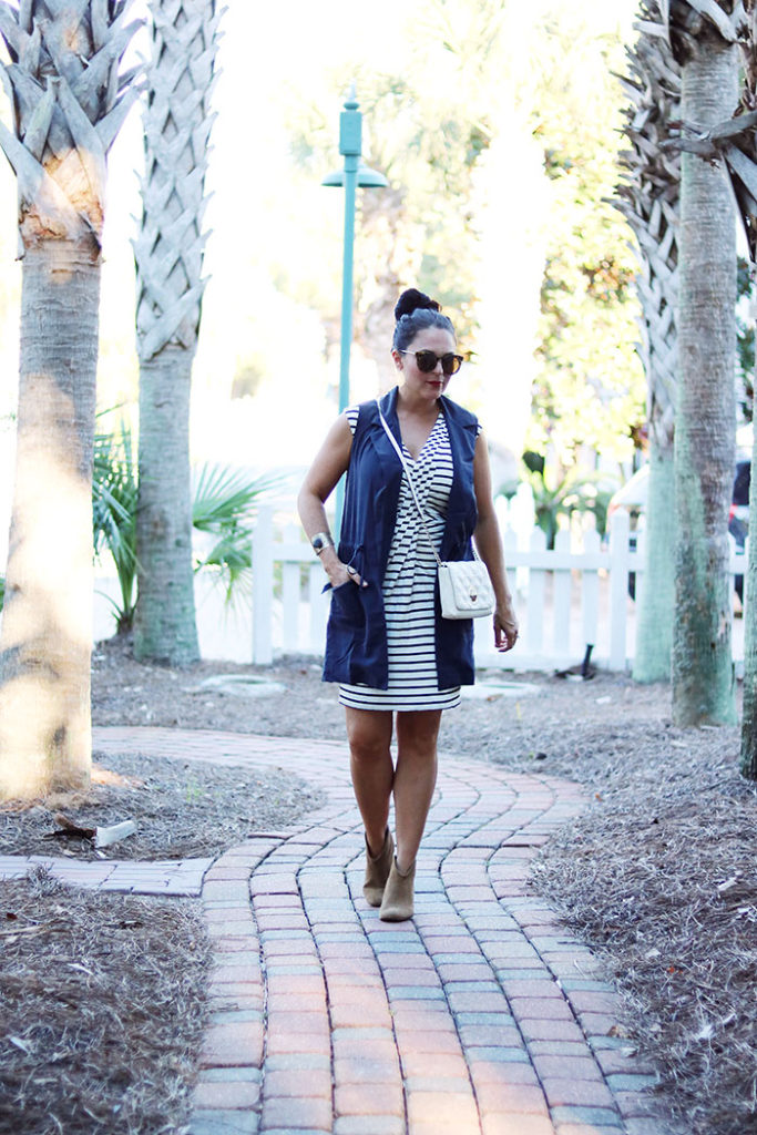 transitional-clothing-for-fall-walking, transitional-pieces-for-fall, transitioning summer to fall outfit, transitional wardrobe, fall wardrobe, black and white striped dress, summer dress, cardigan, dress with booties
