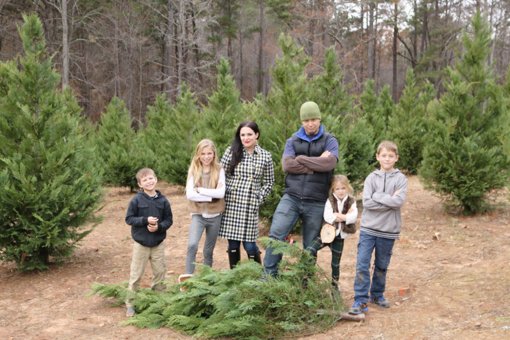 cutting-down-the-christmas-tree-family-pictuyre