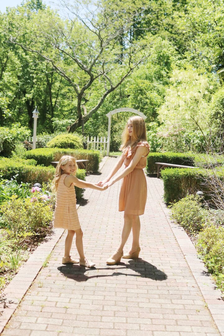 The perfect time to wear Mother Daughter Matching Dresses is for Mother's Day! Sharing a few cute matching dresses to wear this spring! || Darling Darleen www.darlingdarleen.com #darlingdarleen