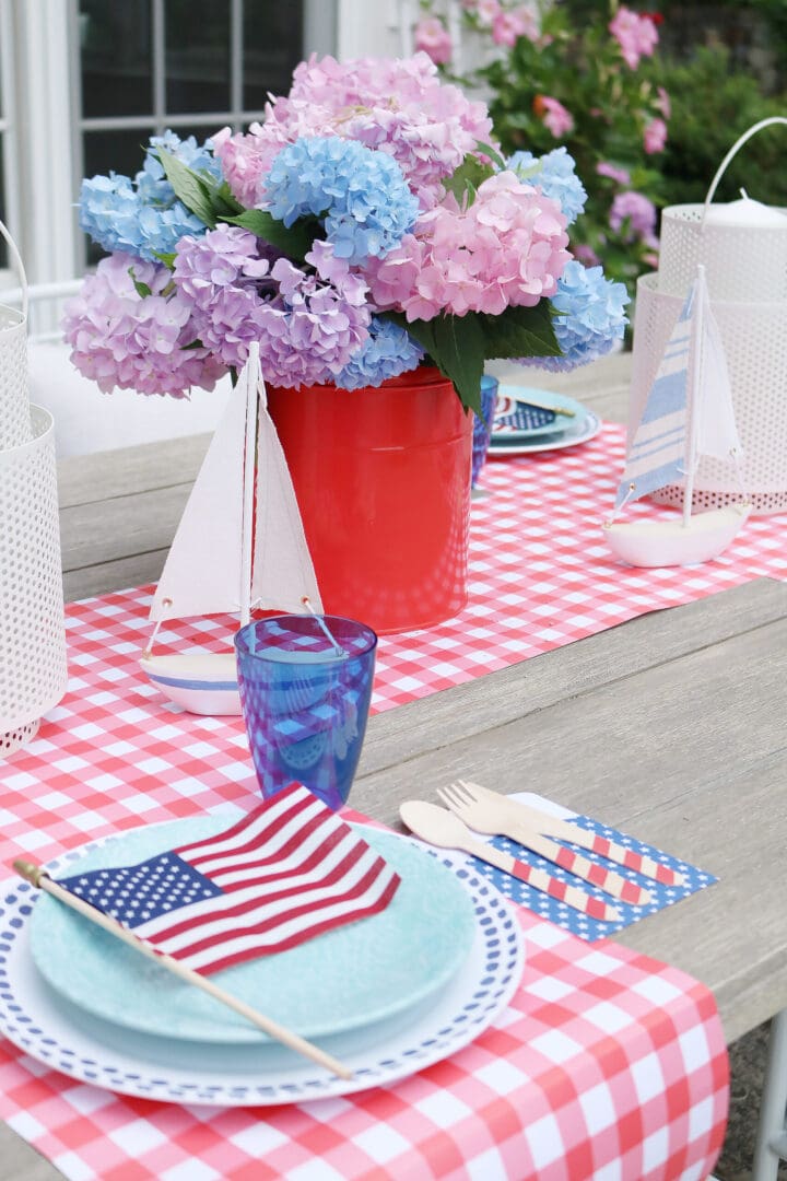 This year host a 4th of July barbecue party and sharing simple budget-friendly decorating tips, 4th of July outfit, red gingham dress, 4th of July entertaining tips, american flag decorations, backyard party, 4th of july tablescape  || Darling Darleen Top CT Lifestyle Blogger #4thofjuly #4thofjulyoutfit